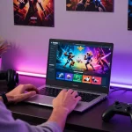 Player using the Raja Game login on a laptop with vibrant graphics in a cozy gaming setup.